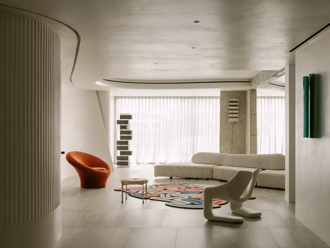 Modern living room with concrete, wood, fabric, and metal materials and minimalist design