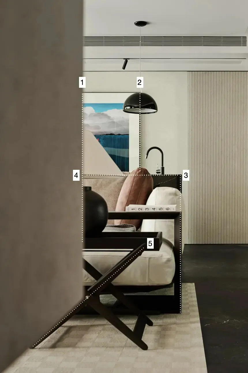 Modern living room with a white sofa, wooden accents, and a black lamp.