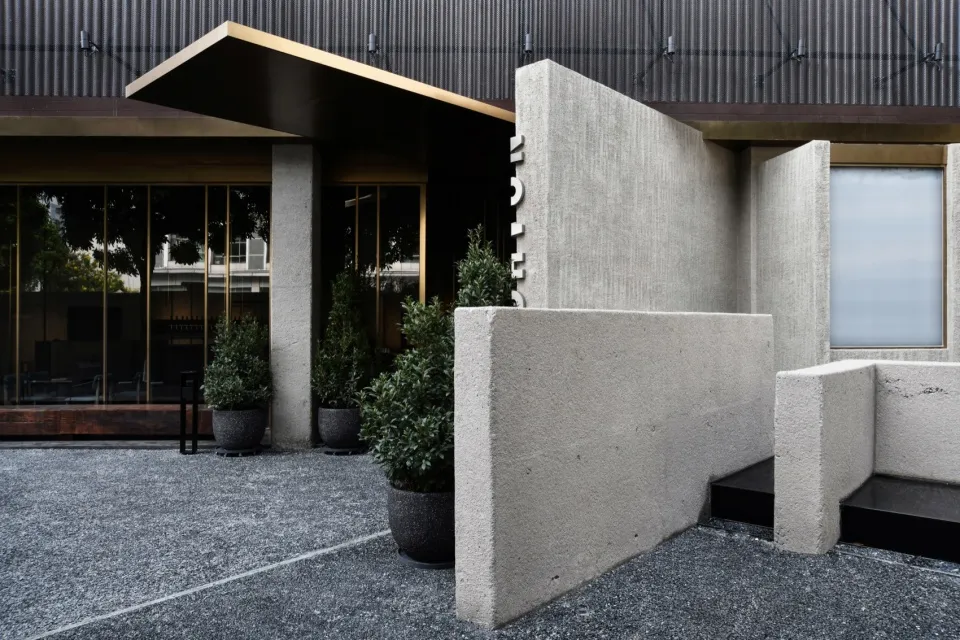 Concrete and glass entrance area of a modern commercial building