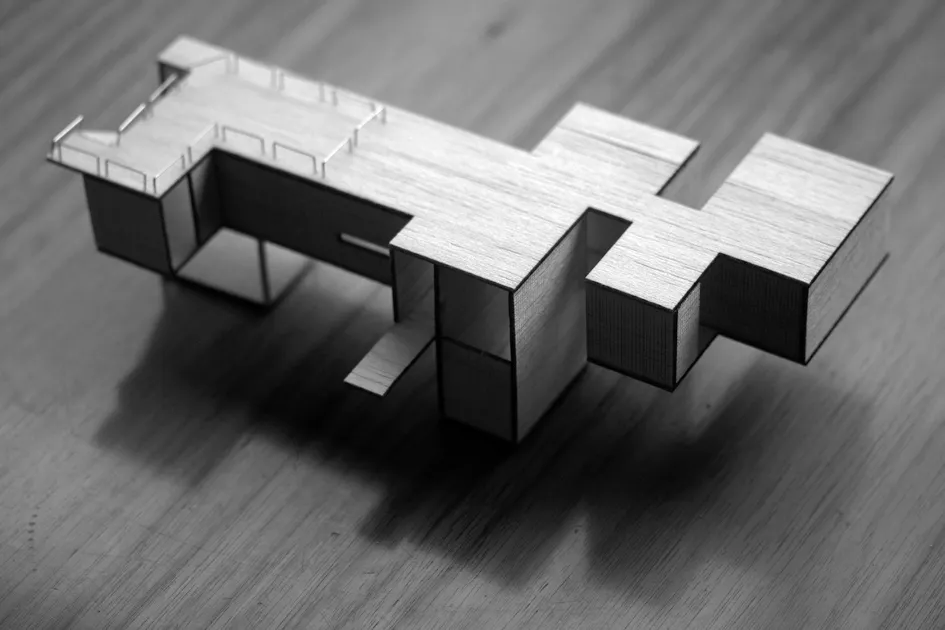 A modern residential house rendered in wood material