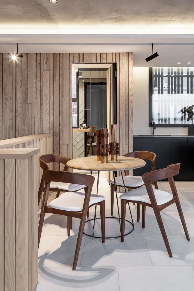 A modern interior design featuring wooden furniture and elements.