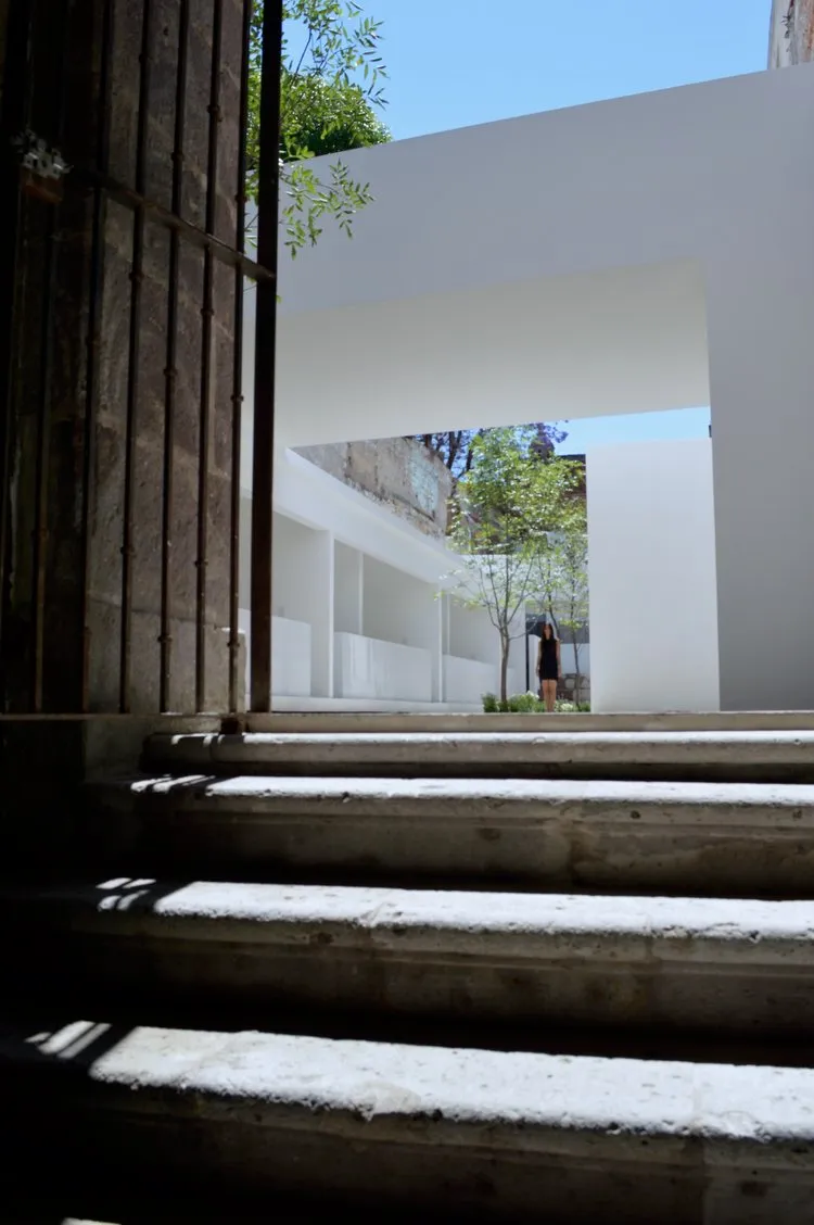A minimalist interior space with concrete features.