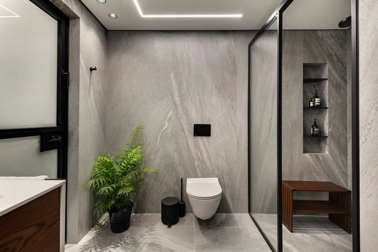 Modern bathroom design featuring marble elements