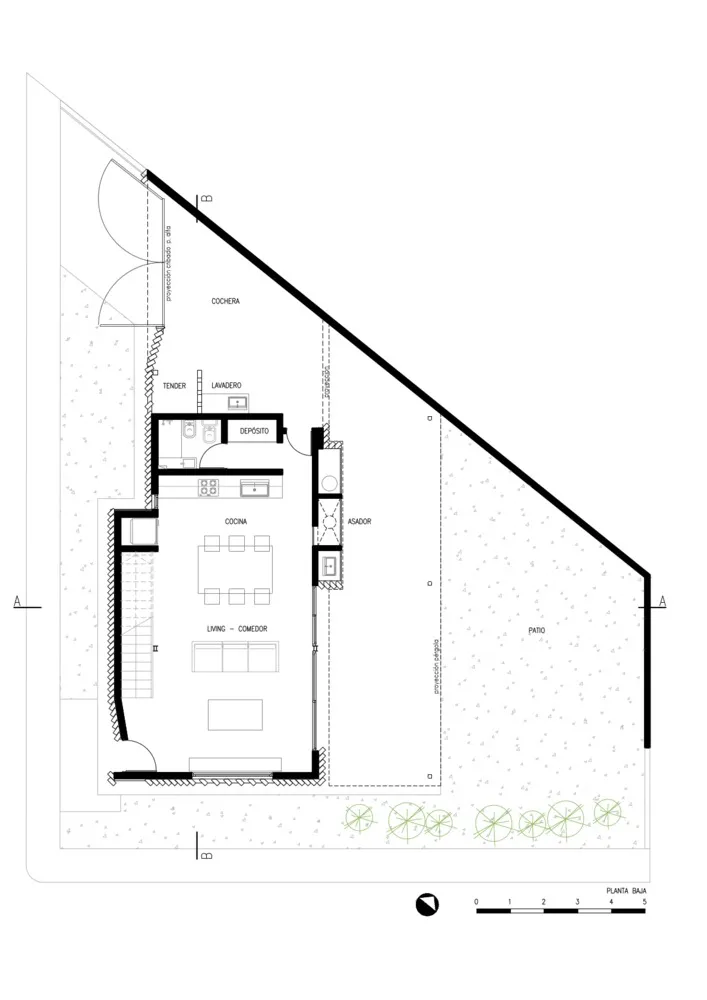 Floor plan of a residential layout with a living room, dining room, kitchen, and additional spaces.