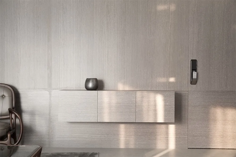 A modern minimalist living room with a light-colored wooden cabinet and a vase on top.
