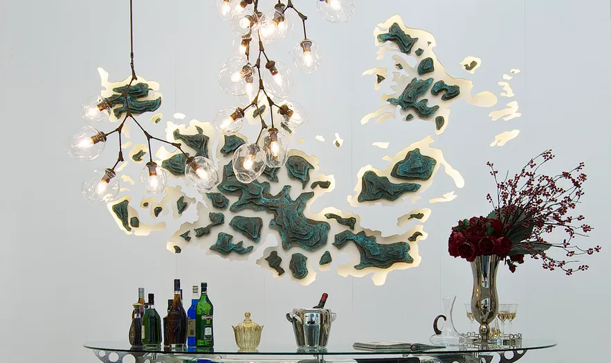 A modern art installation featuring industrial materials like iron and glass