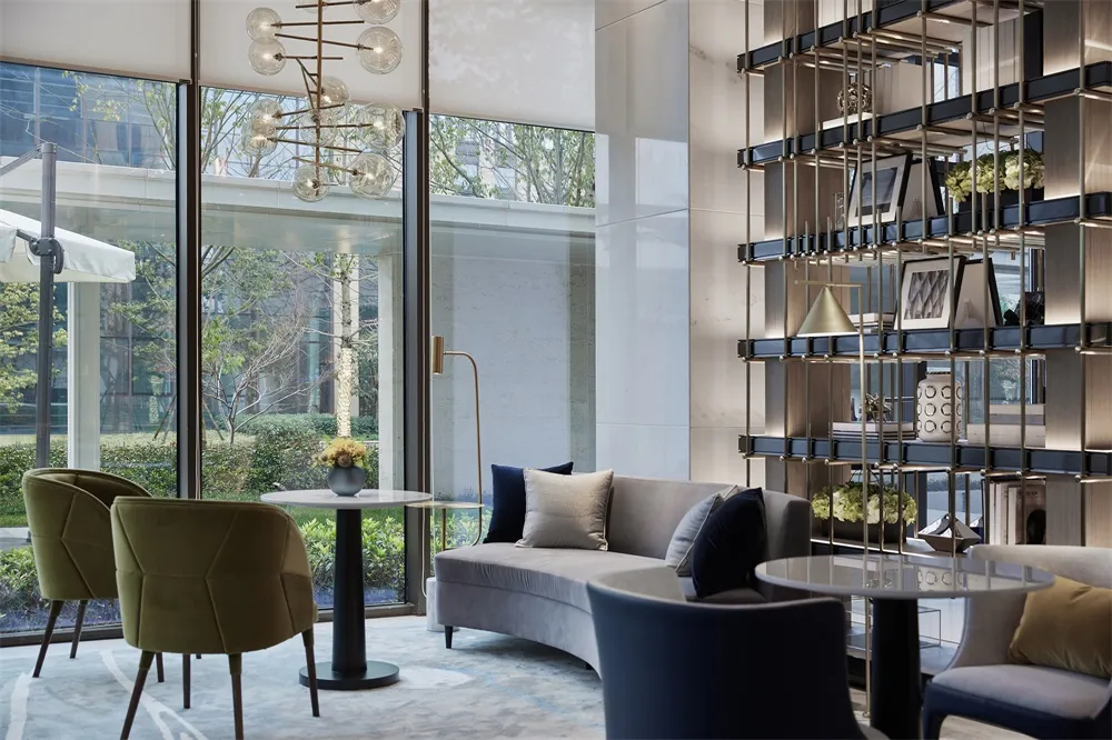 Modern lobby with luxurious marble flooring, comfortable seating, and contemporary design elements