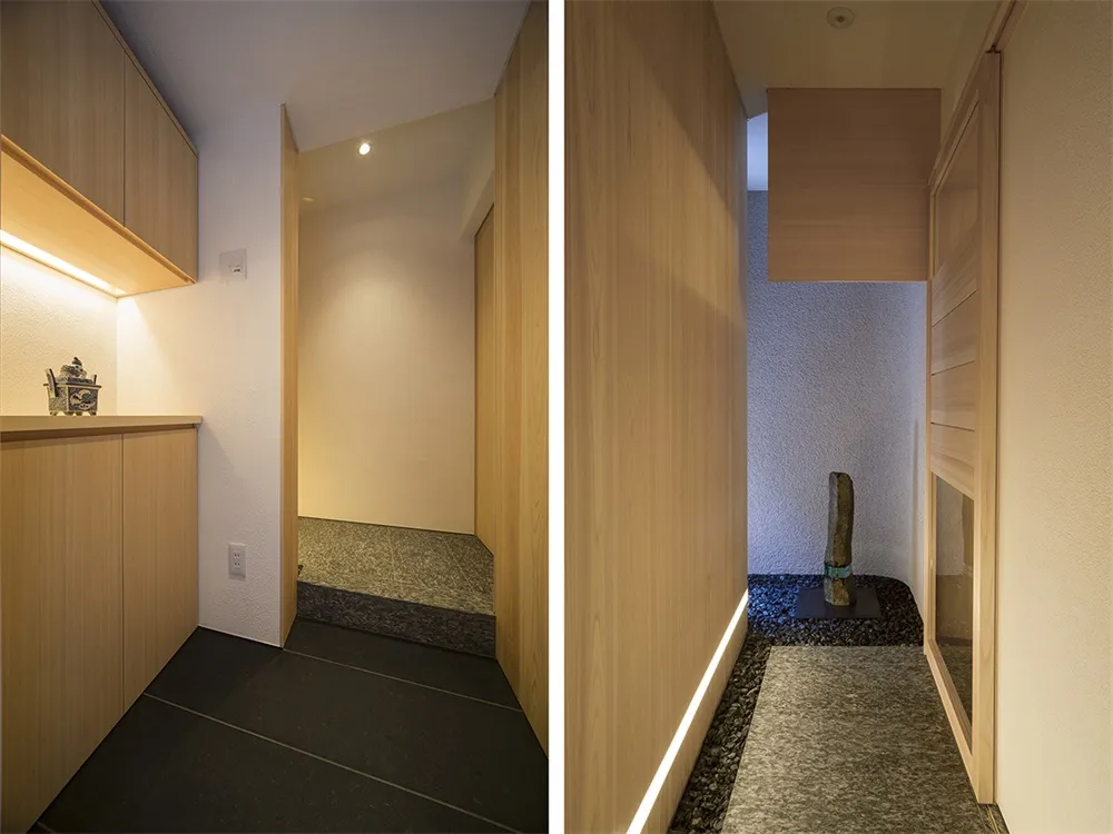 Modern interior design featuring a contemporary entryway with a wooden floor and minimalist aesthetic.