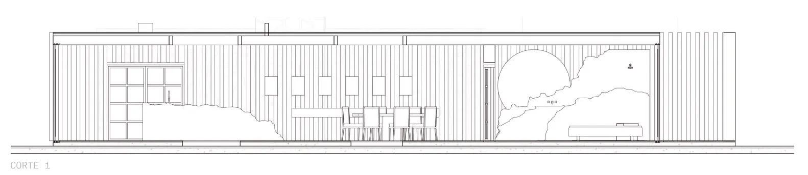 A restaurant interior with wooden walls and a seating area.