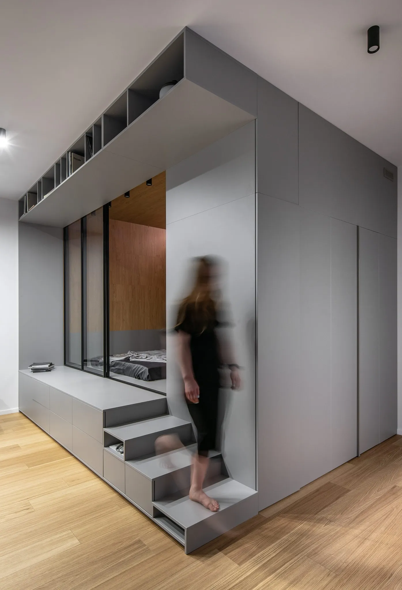 A minimalist residential interior featuring modern materials and clean lines
