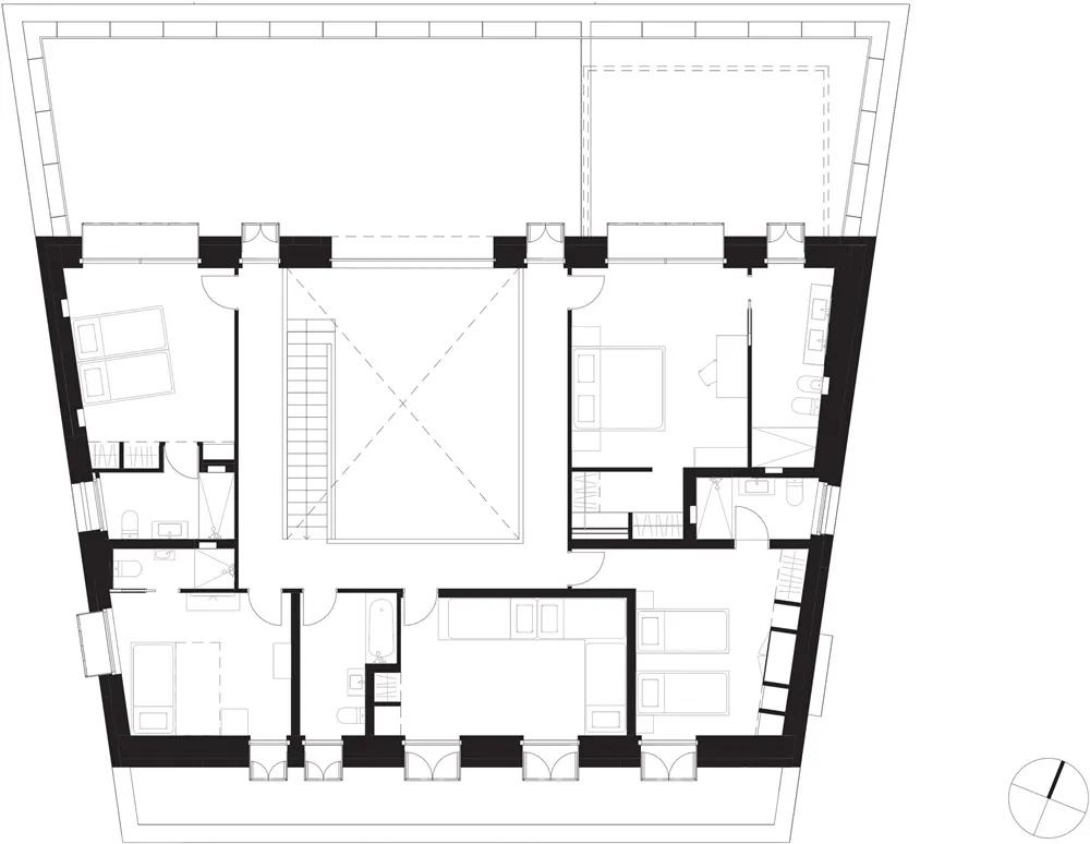 Black and white floor plan of a residential house, showing layout and rooms.