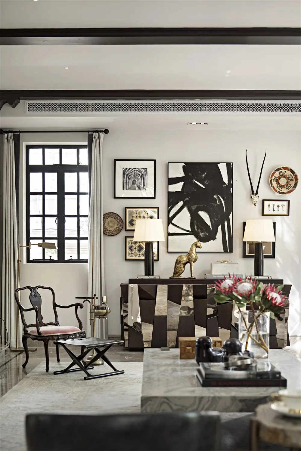 Modern living room featuring mixed materials and contemporary decor.