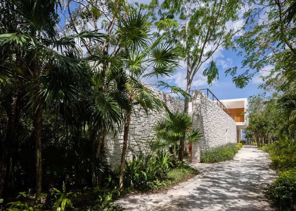 Modern contemporary white walls and concrete roadside view of a building
