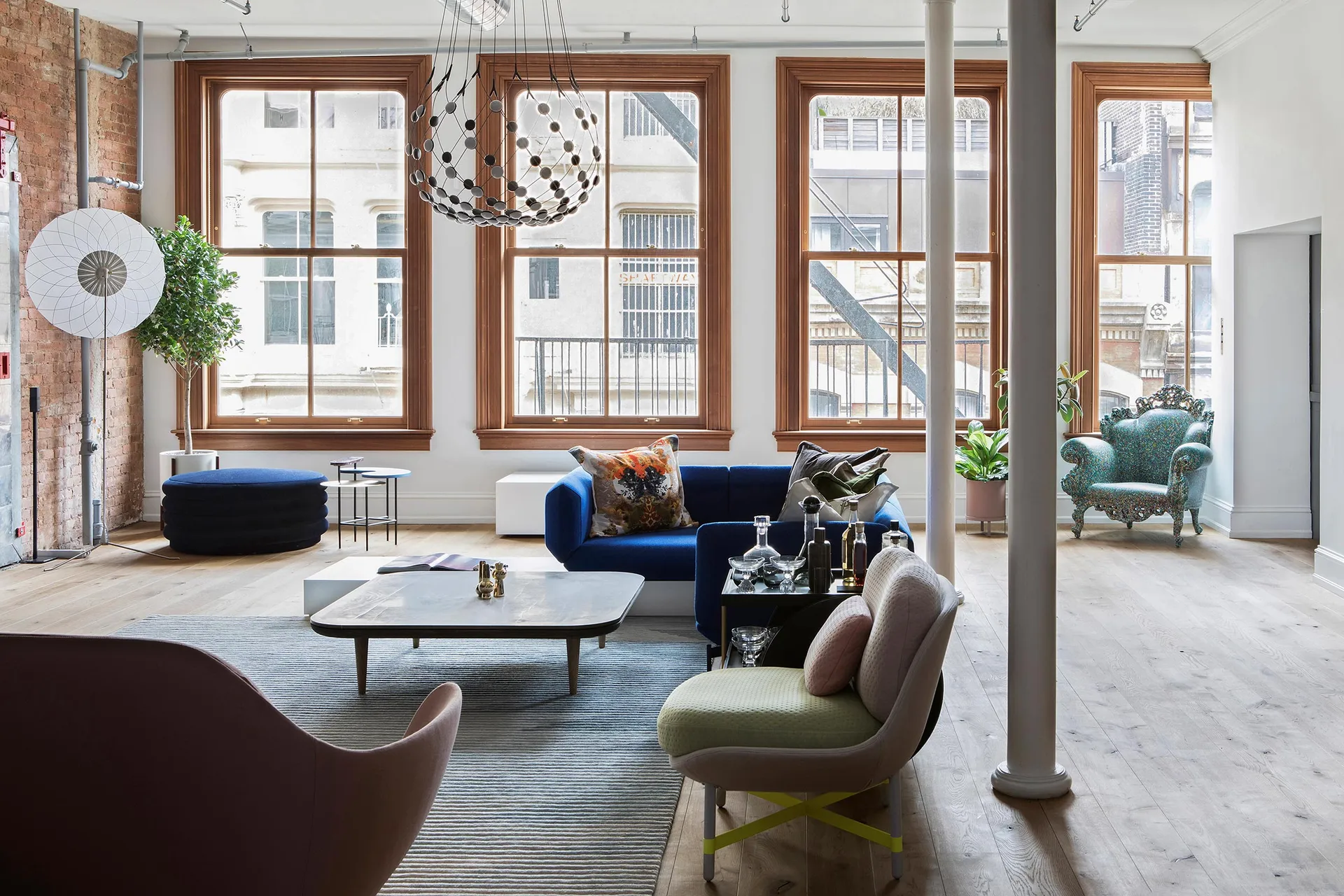 A modern interior living room with wooden floors and minimalist furniture.