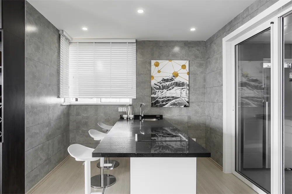 Minimalist kitchen featuring concrete countertops and minimalist design.