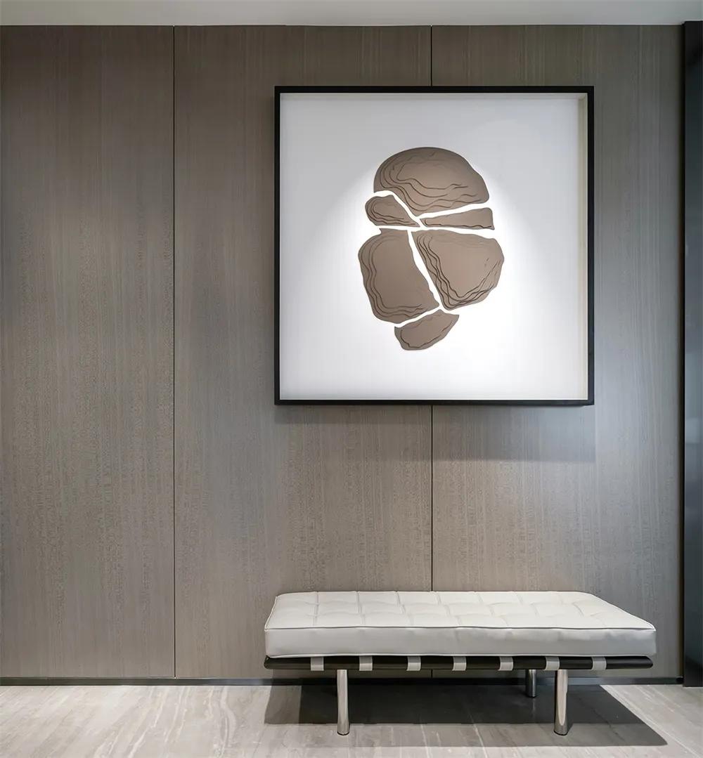 A modern piece of art featuring abstract patterns on a contemporary wooden wall.