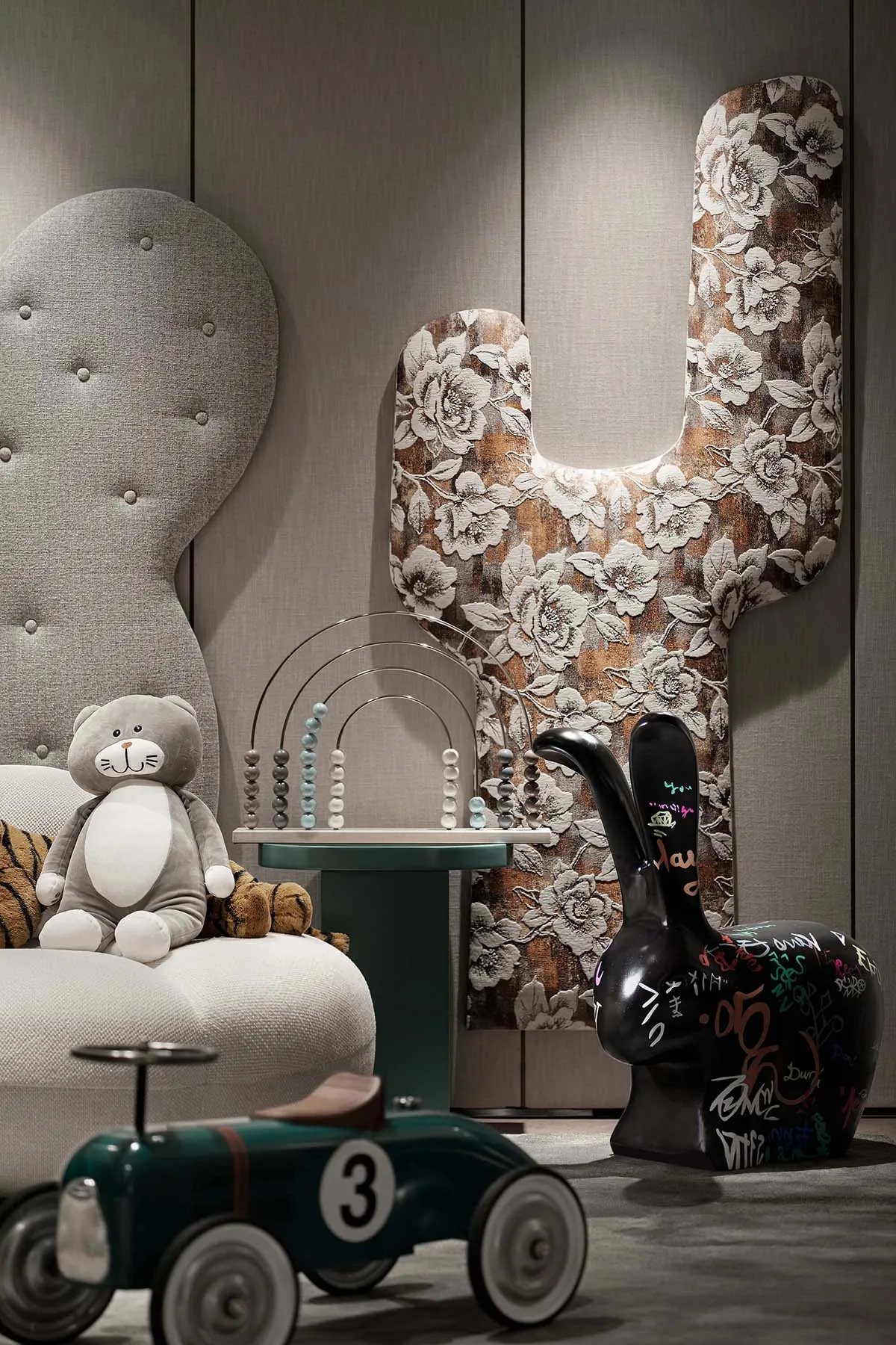 A playful interior design of a children's playroom featuring various toys and furniture.