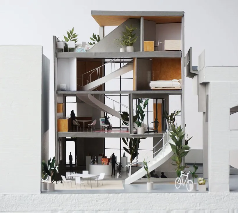 A modern apartment with concrete floors and minimalist design.