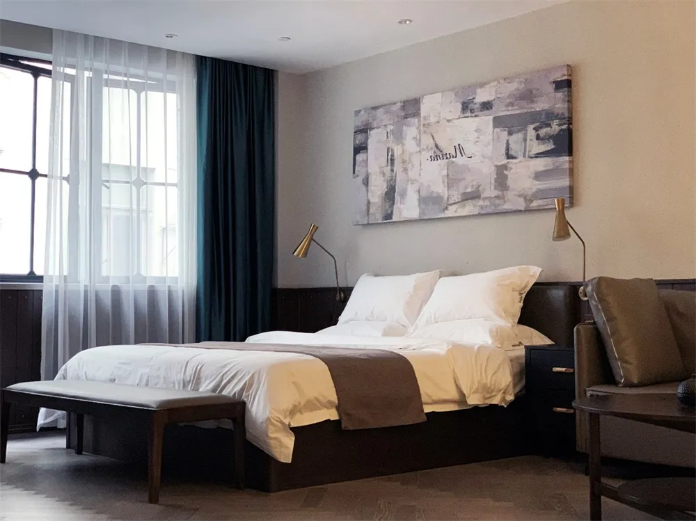 A modern bedroom with a brown bed in a minimalist style