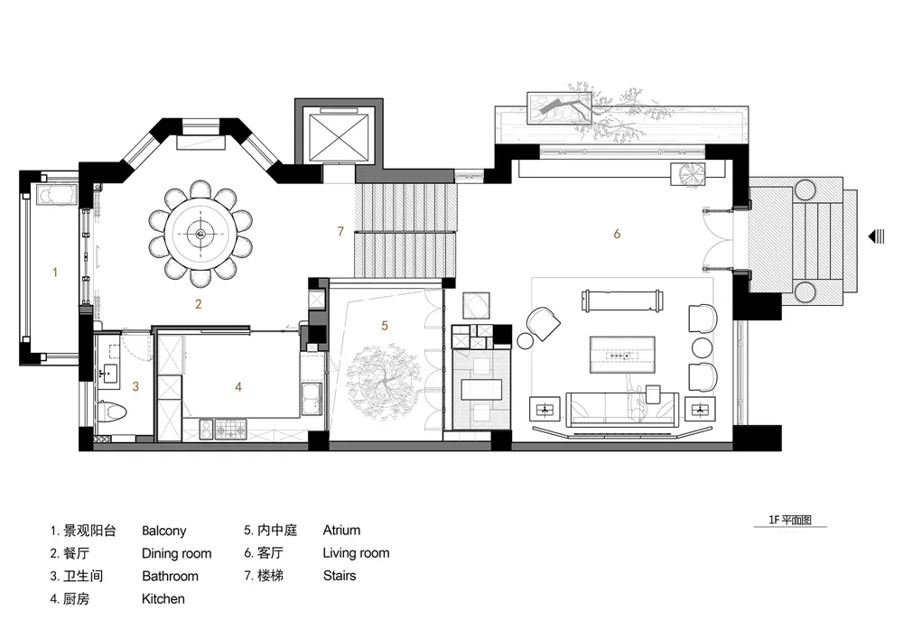 A modern living room layout with furniture and a staircase.