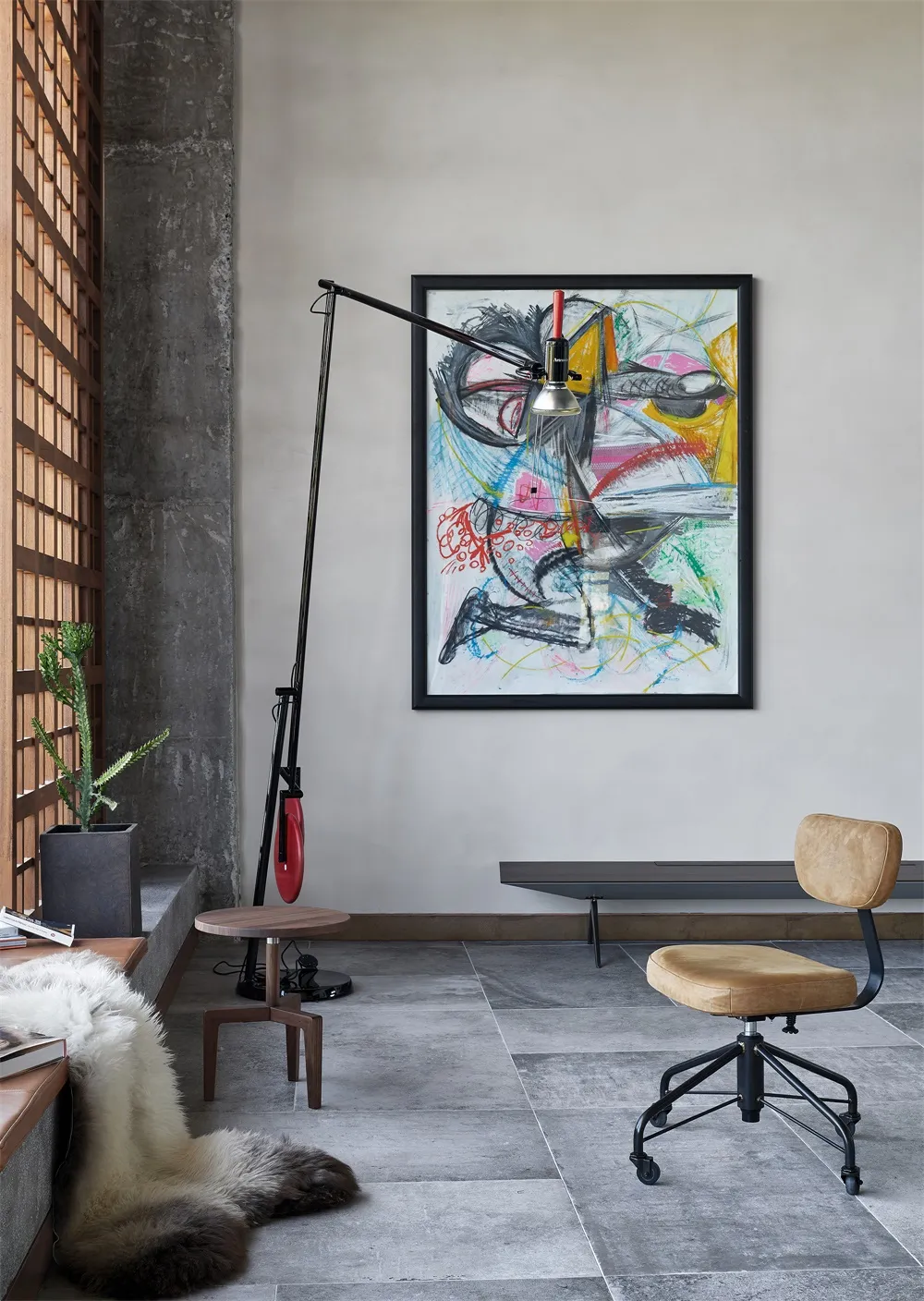 Modern industrial interior design featuring concrete and leather materials in a spacious, minimalist environment.