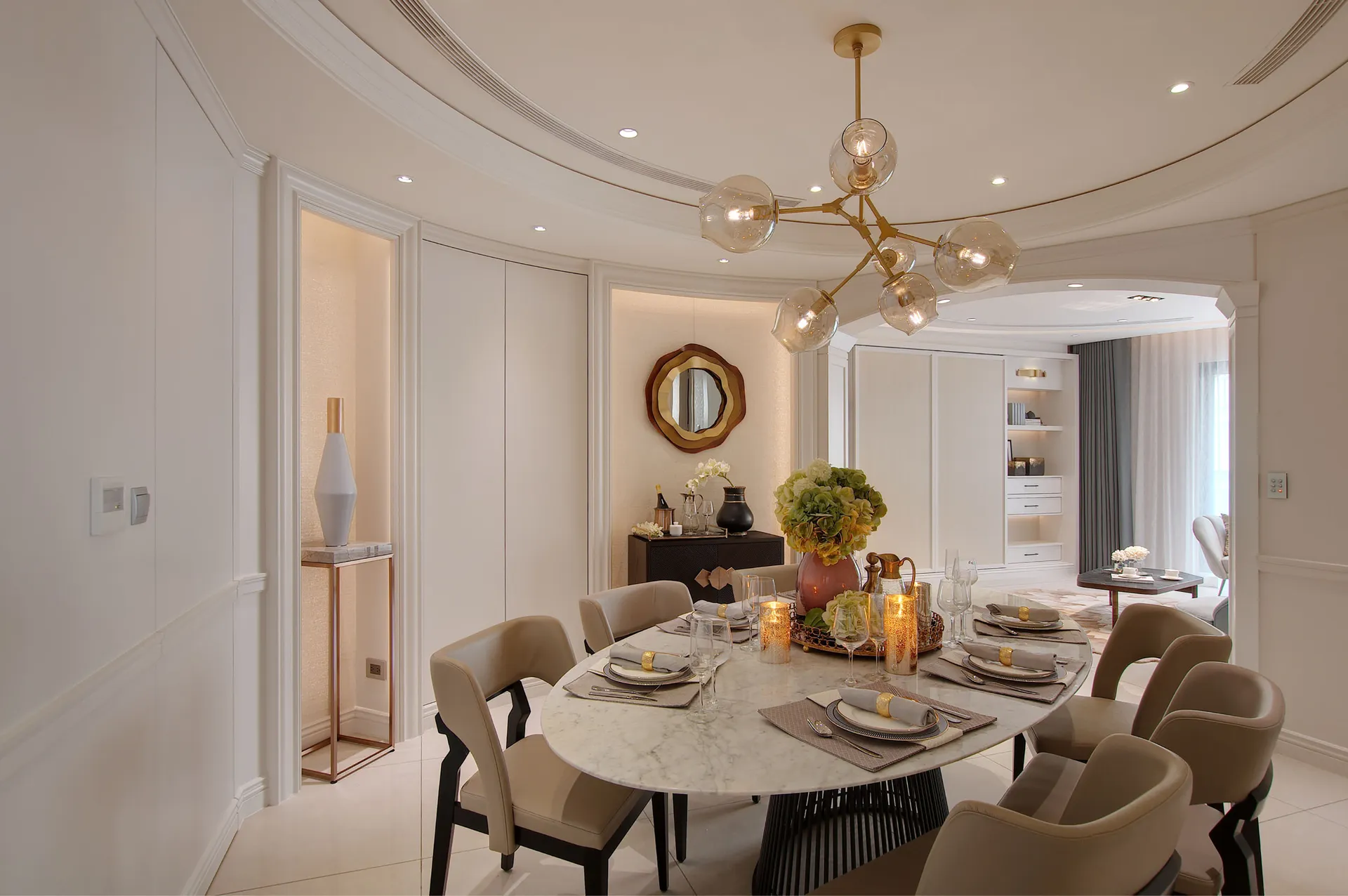 Modern dining room with marble table and glass chandelier