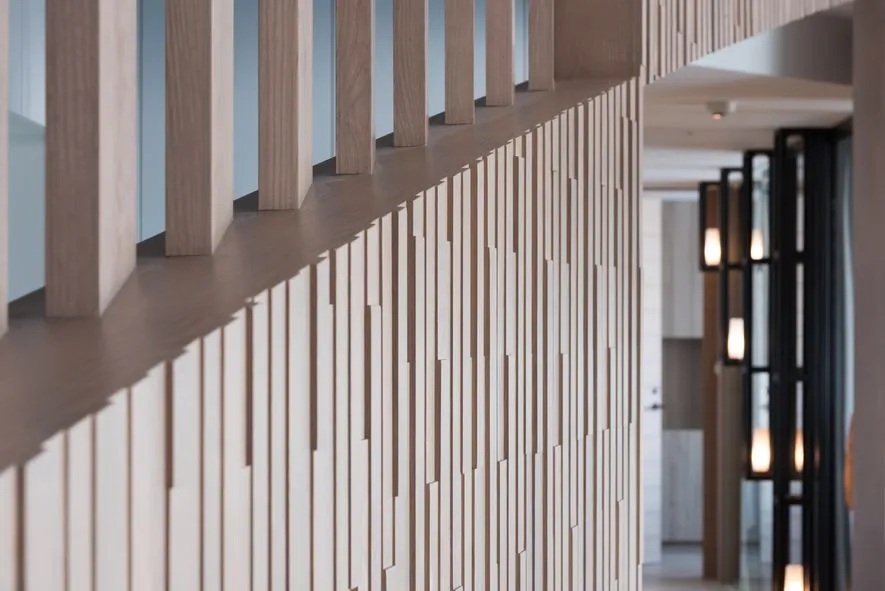Modern interior design featuring wooden paneling.