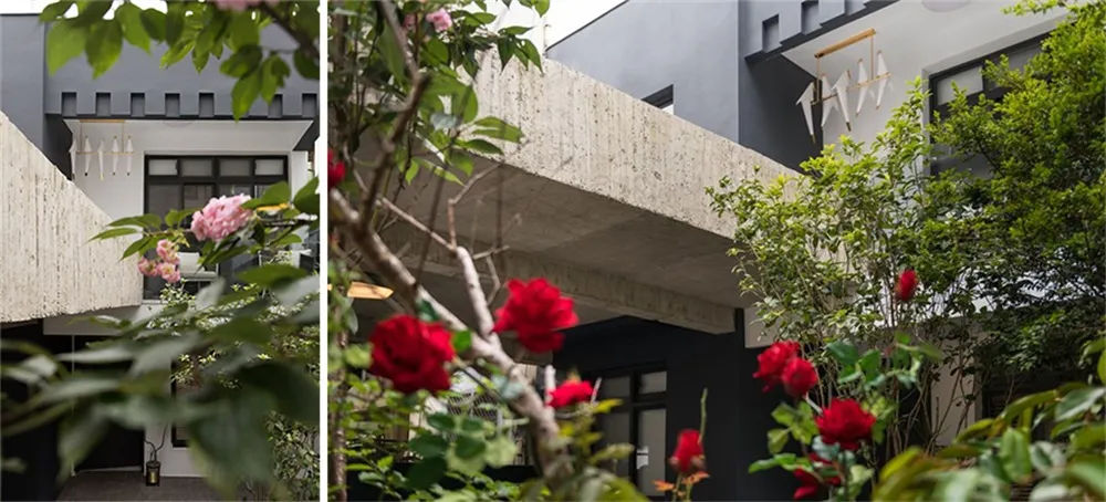 Concrete facade of a modern building with greenery.