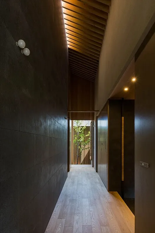 Modern corridor with concrete and wooden elements