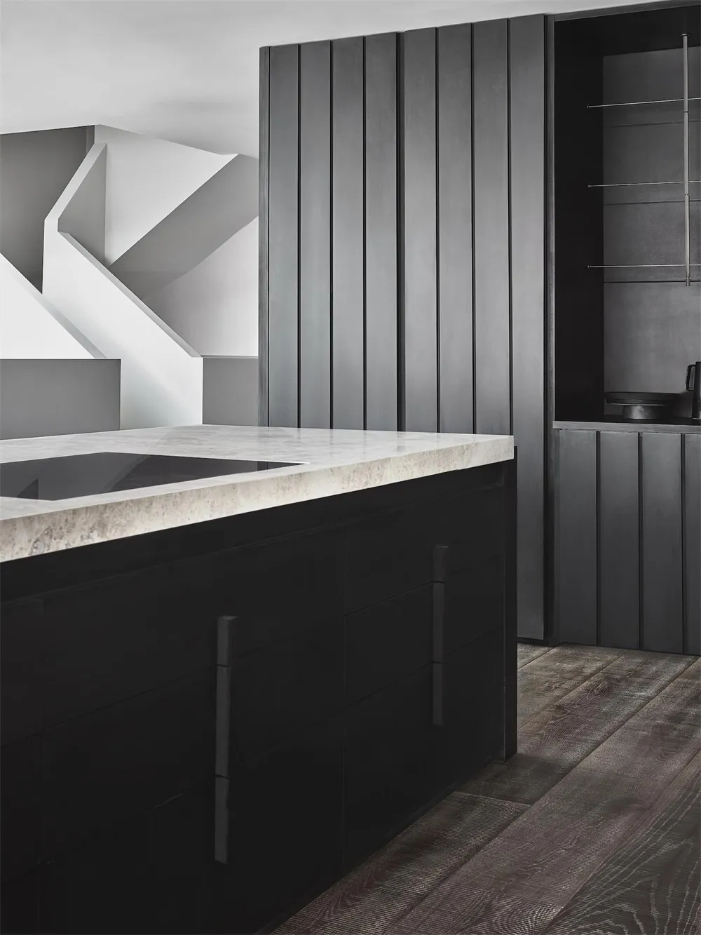 Modern kitchen interior designed with concrete cabinets, highlighting sleek, minimalist, and contemporary features.