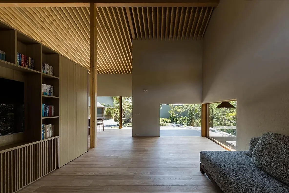 Modern living room featuring wooden elements and a comfortable seating area.