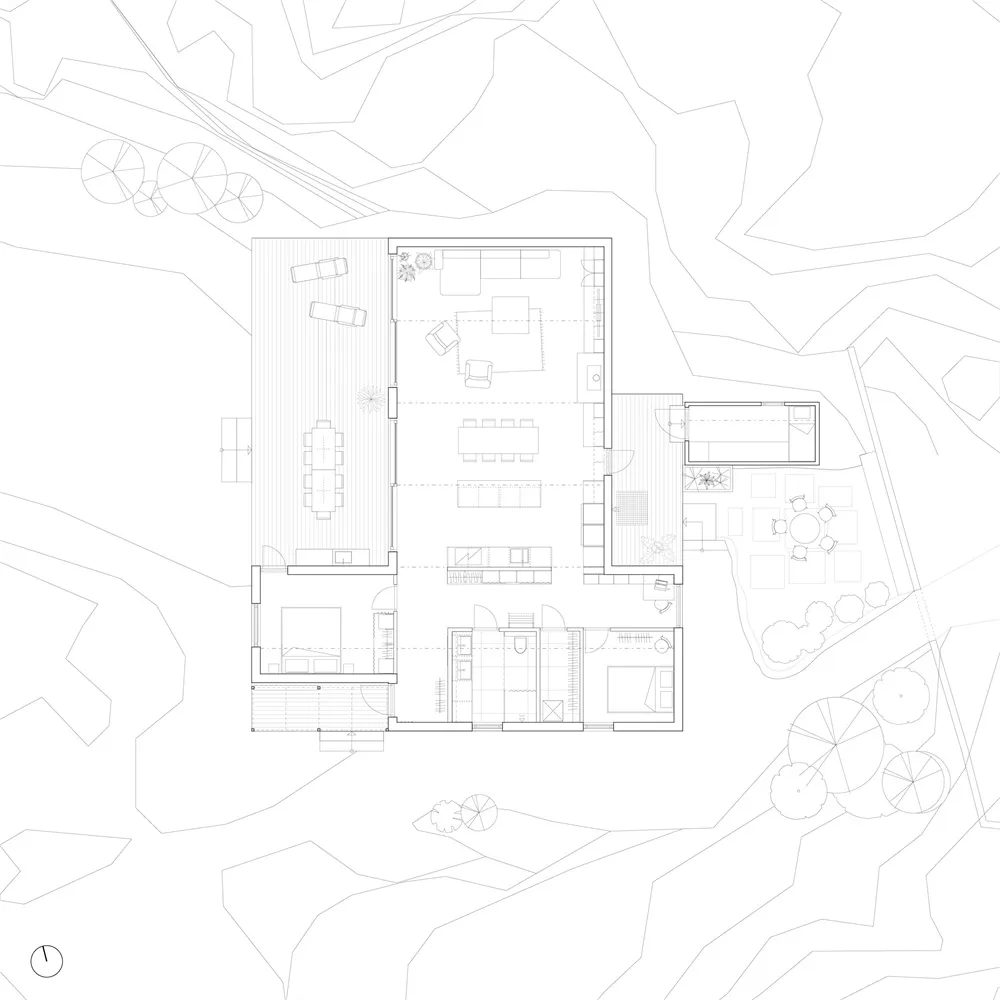 A modern residential floor plan featuring a mix of wood, concrete, and glass materials.