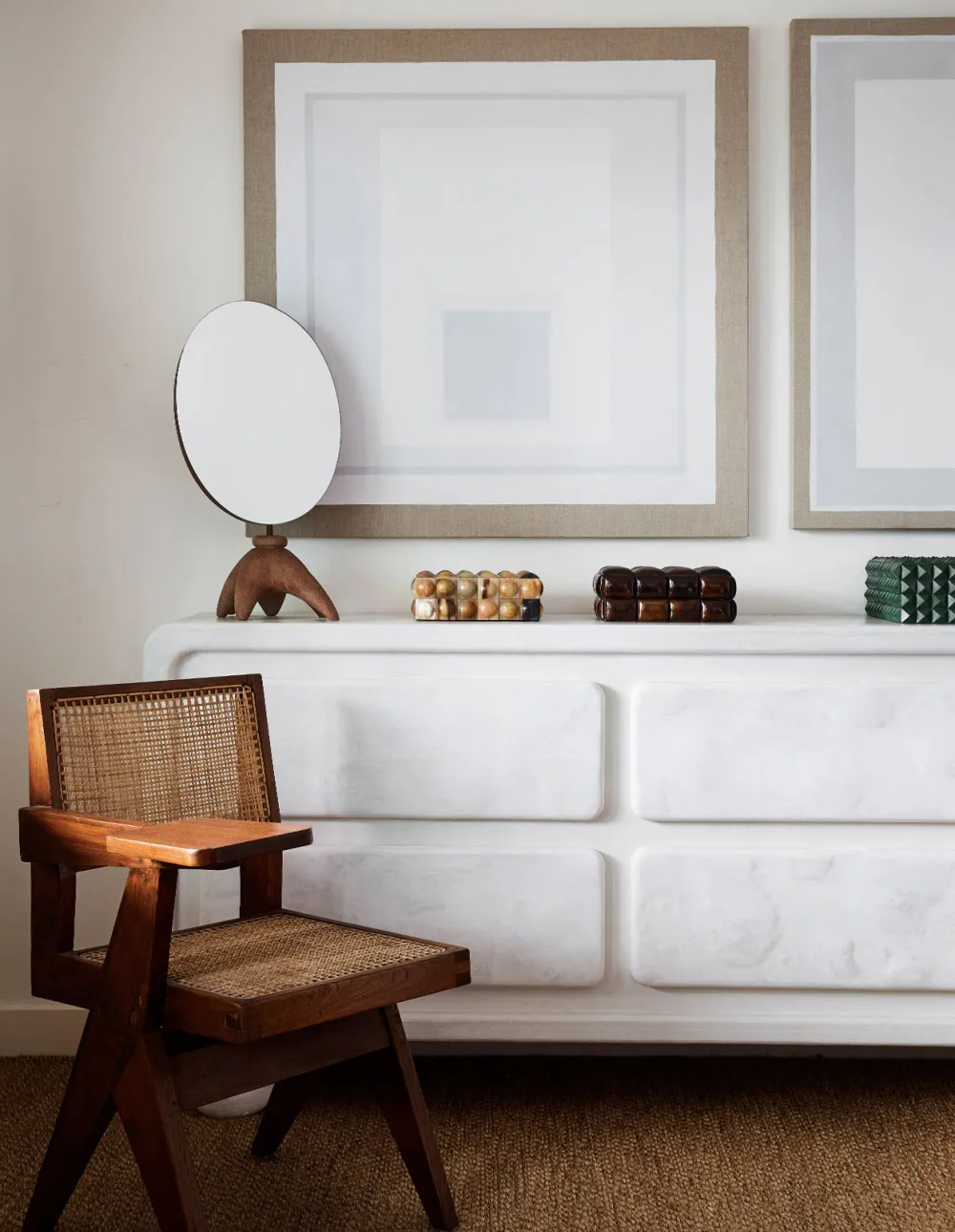 Minimalist furniture, featuring wooden chairs, in a minimalist design setting.
