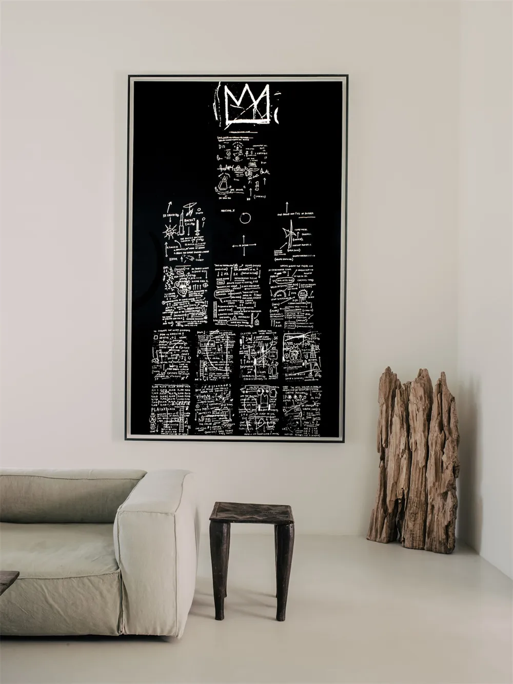 A black and white painting featuring a cityscape with various text and symbols on a white background.