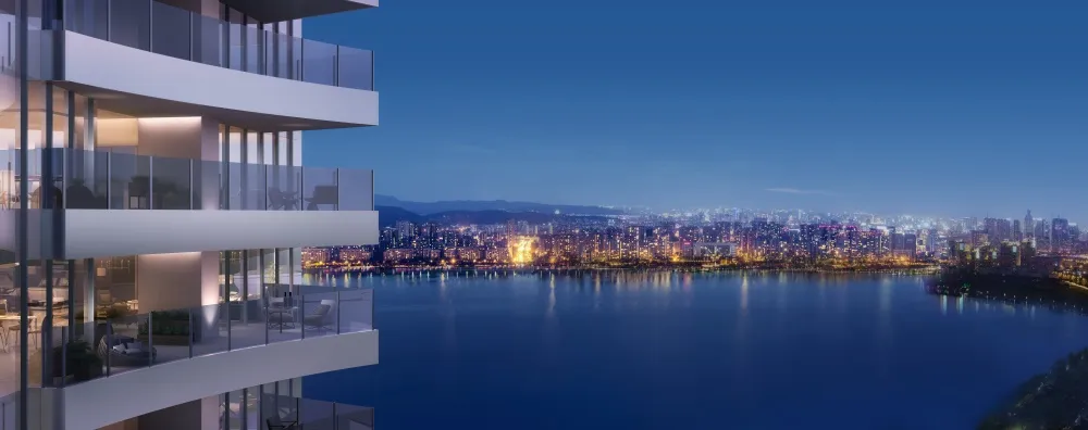 現代住宅公寓配有玻璃陽台,俯瞰夜間城市景觀。