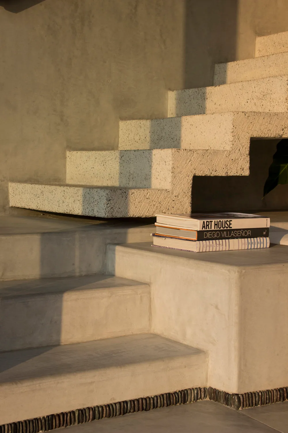Modern staircase made of concrete and stone.