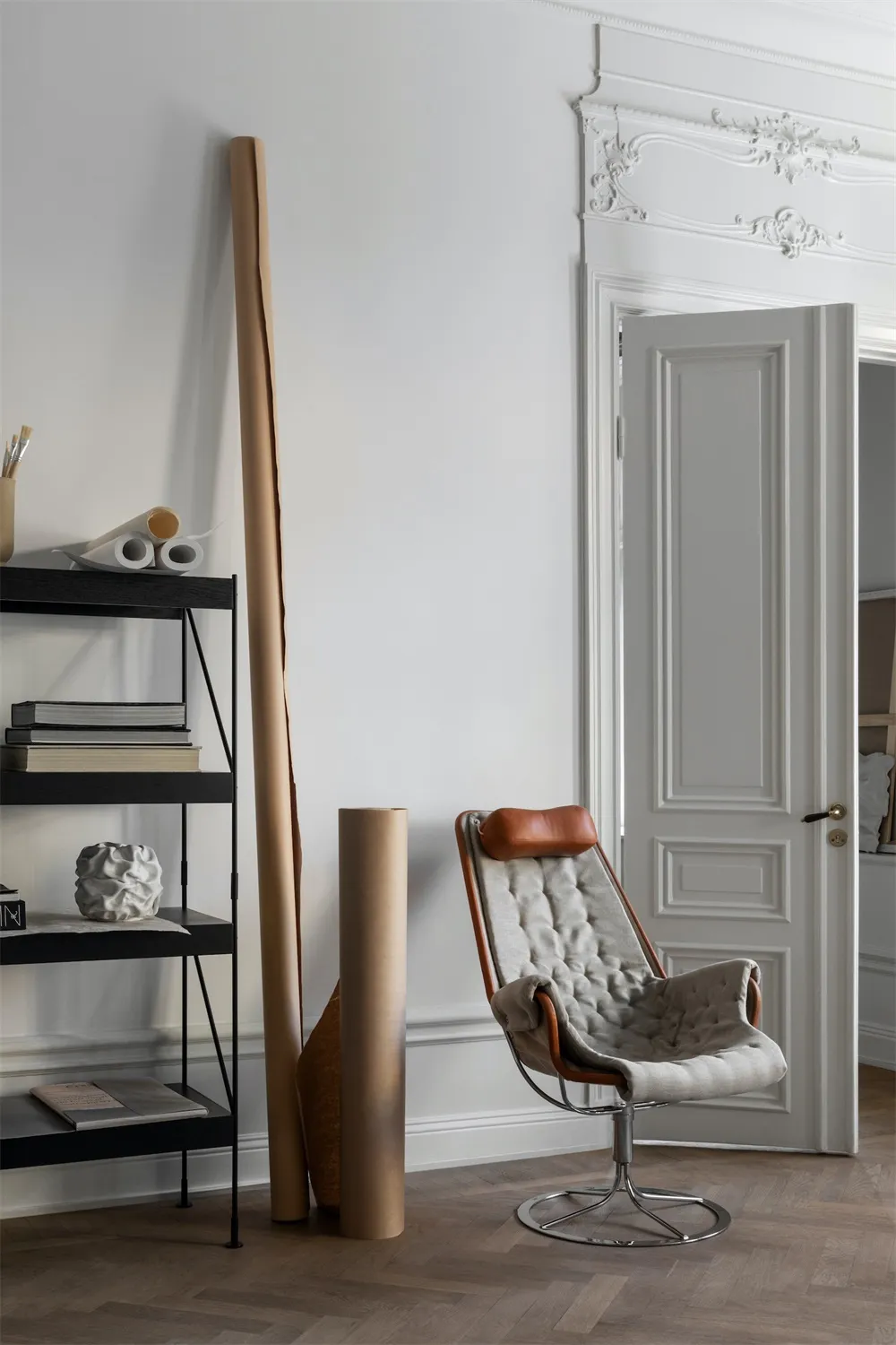 A minimalist office space featuring wood elements.
