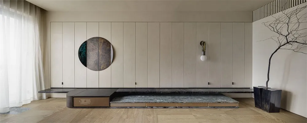 Modern minimalist residential interior featuring marble elements.