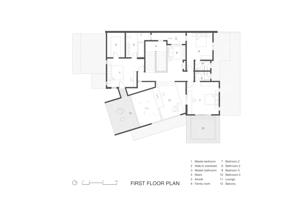 Floor plan of a residential building's first floor with labeled rooms and features.