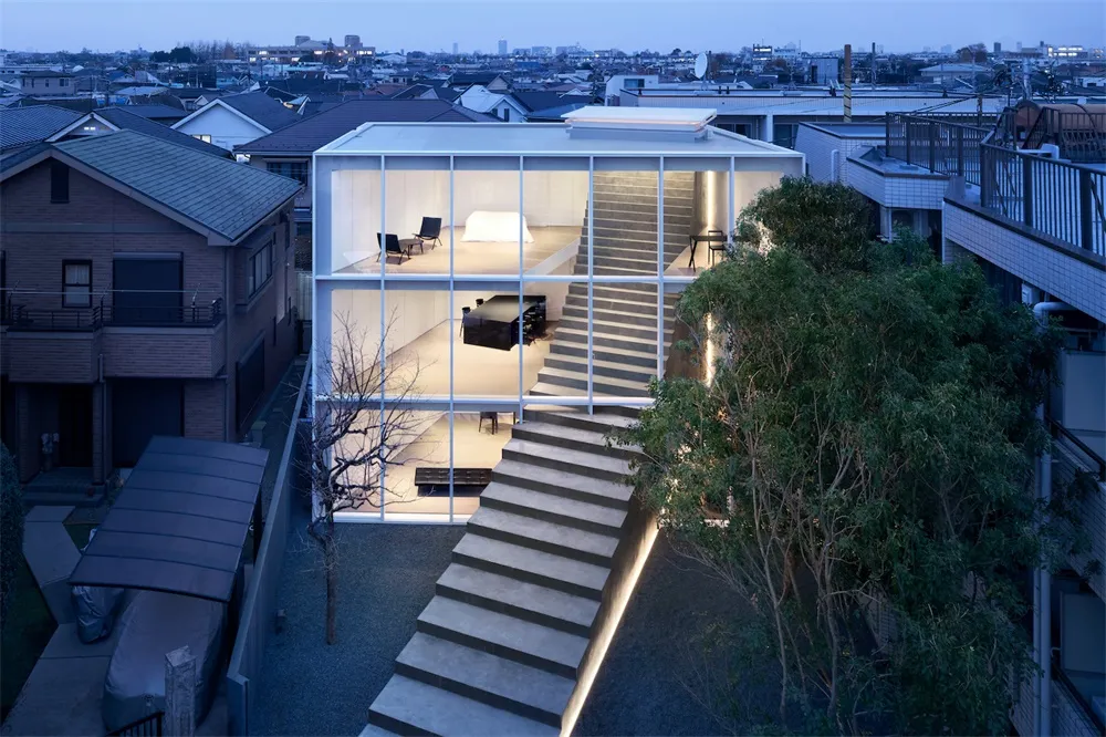 Modern house with large windows and concrete stairs