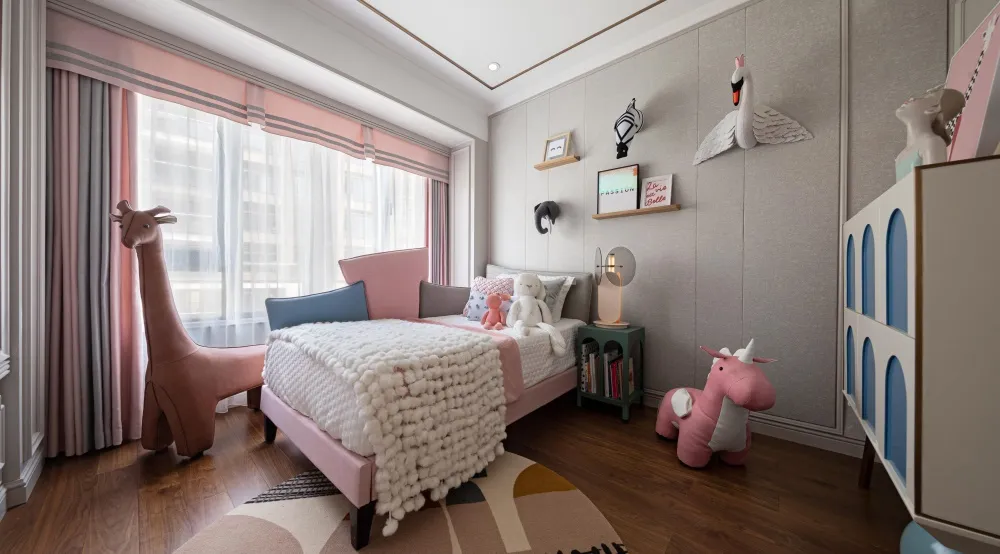 Modern child's bedroom featuring plush toys, a pink bed, and various animal-themed plush objects.