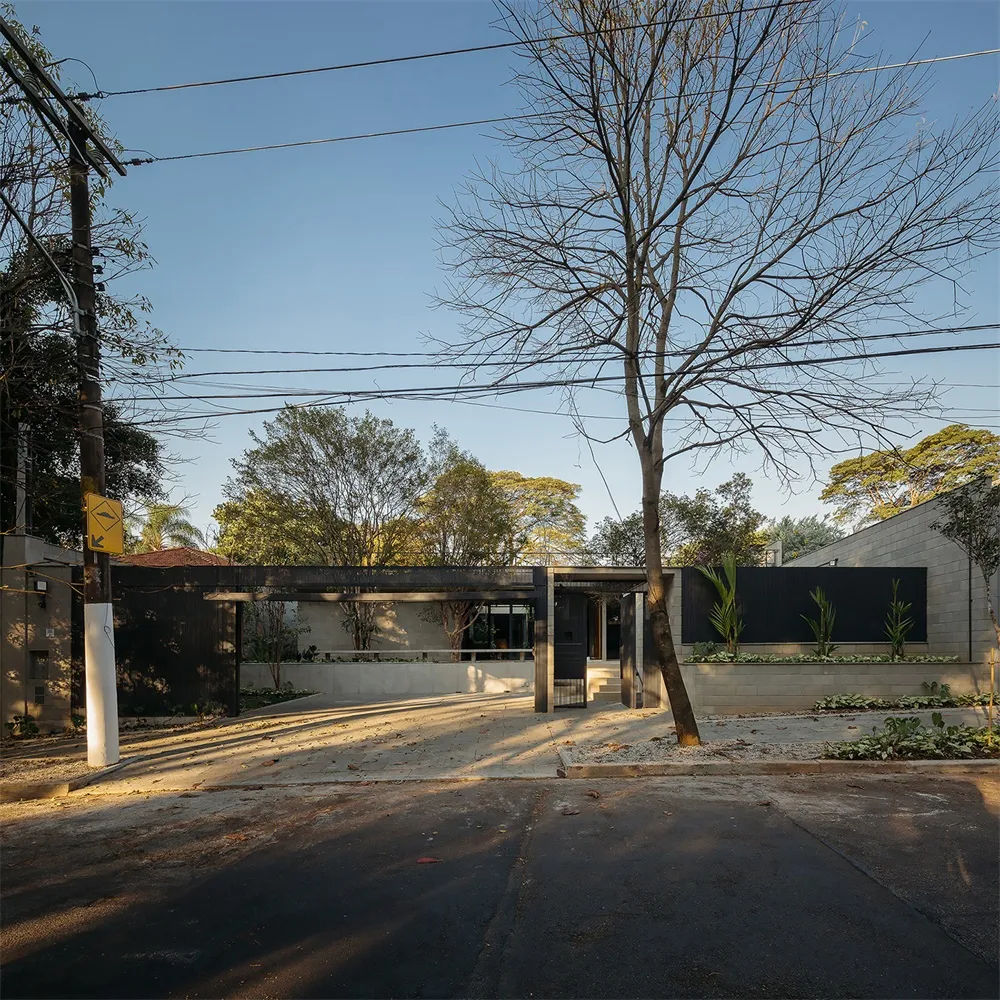 A modern exterior building with a concrete facade and minimalist design.