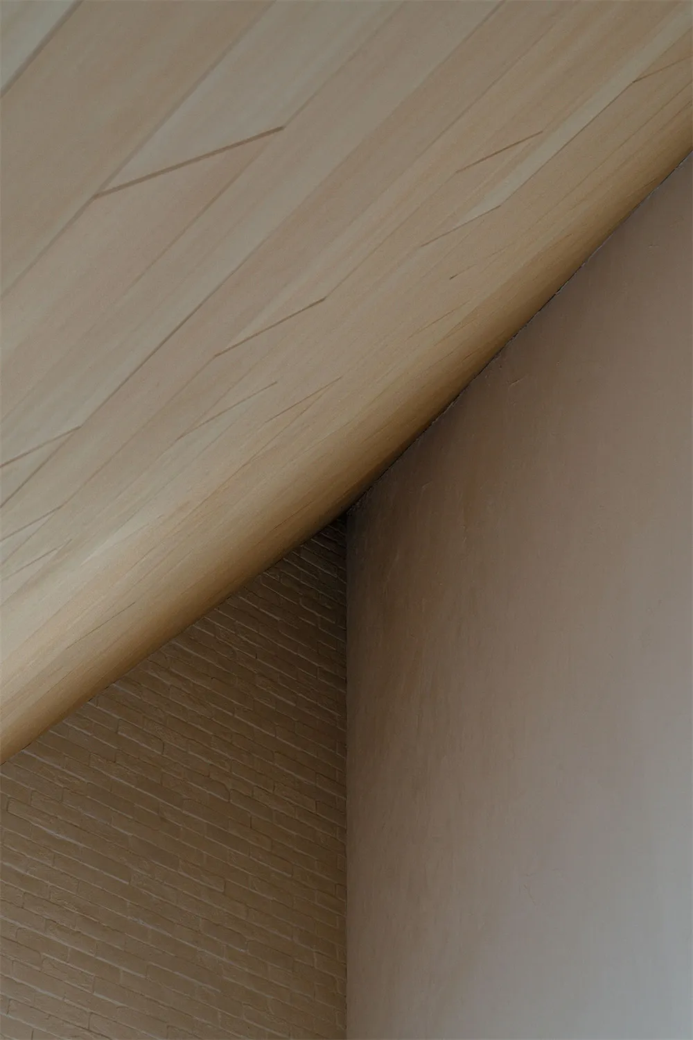 Modern ceiling with a brick and plaster corner detail