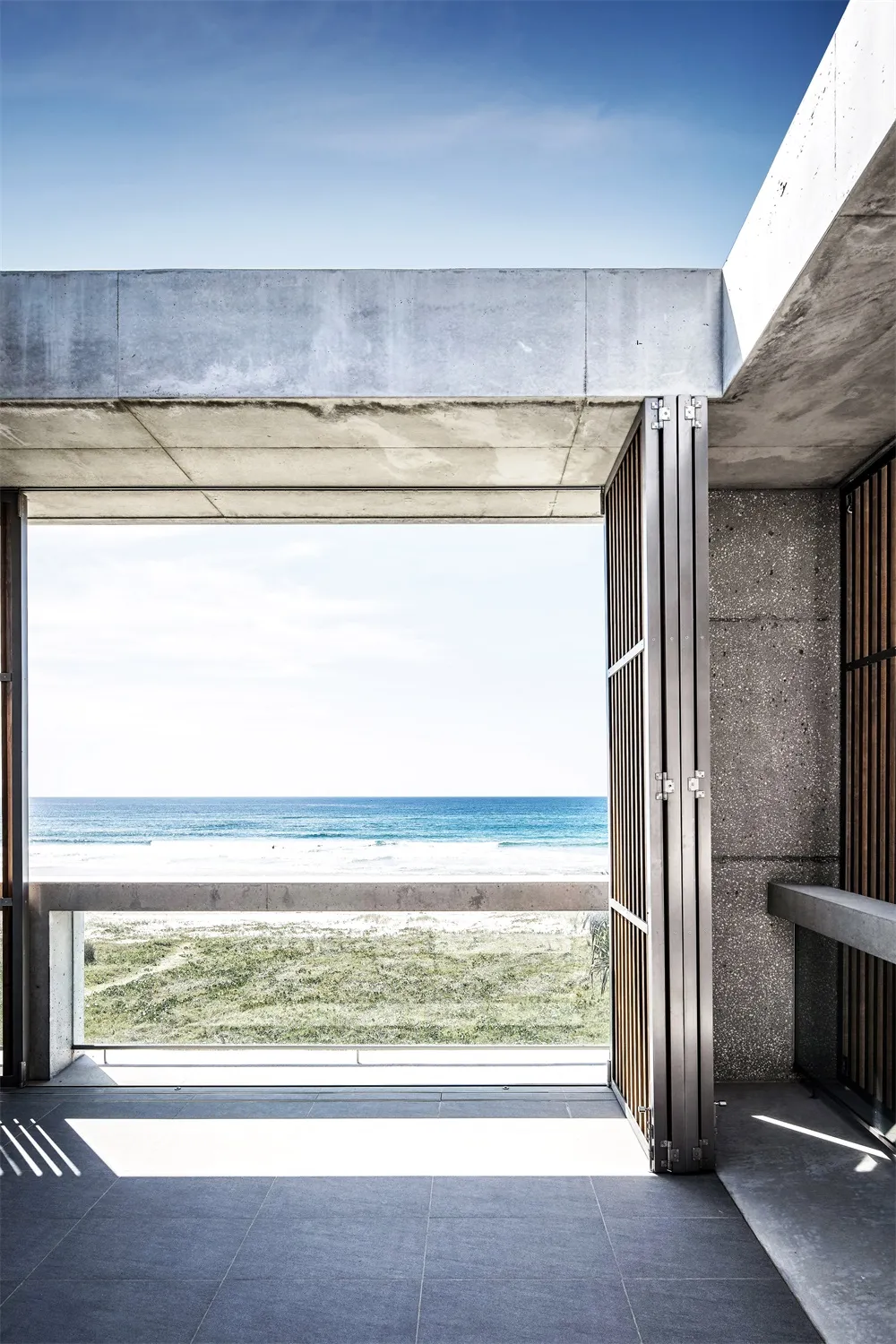 Modern residential porch overlooking ocean
