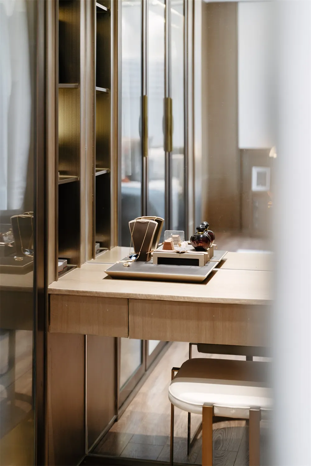 Modern vanity table with a wood finish, showcasing sleek design with minimalistic elements.