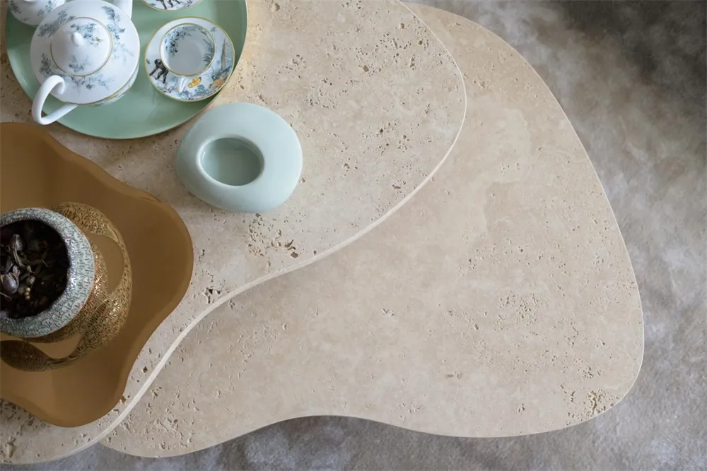 Modern furniture with organic shapes made of natural stone.