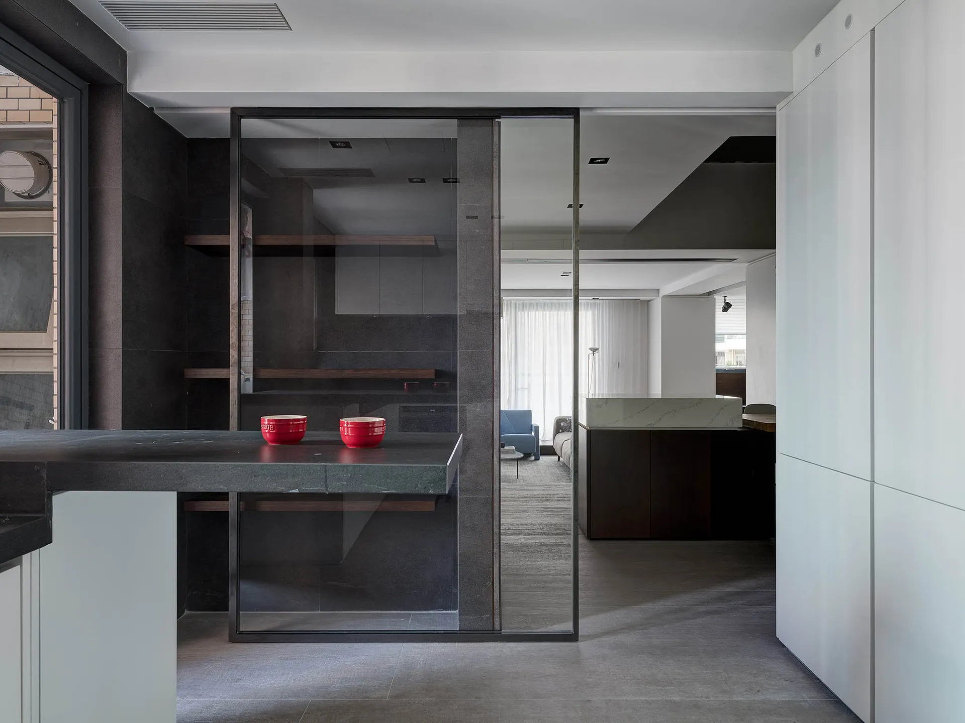 A modern interior space with concrete finishes and minimalist design.
