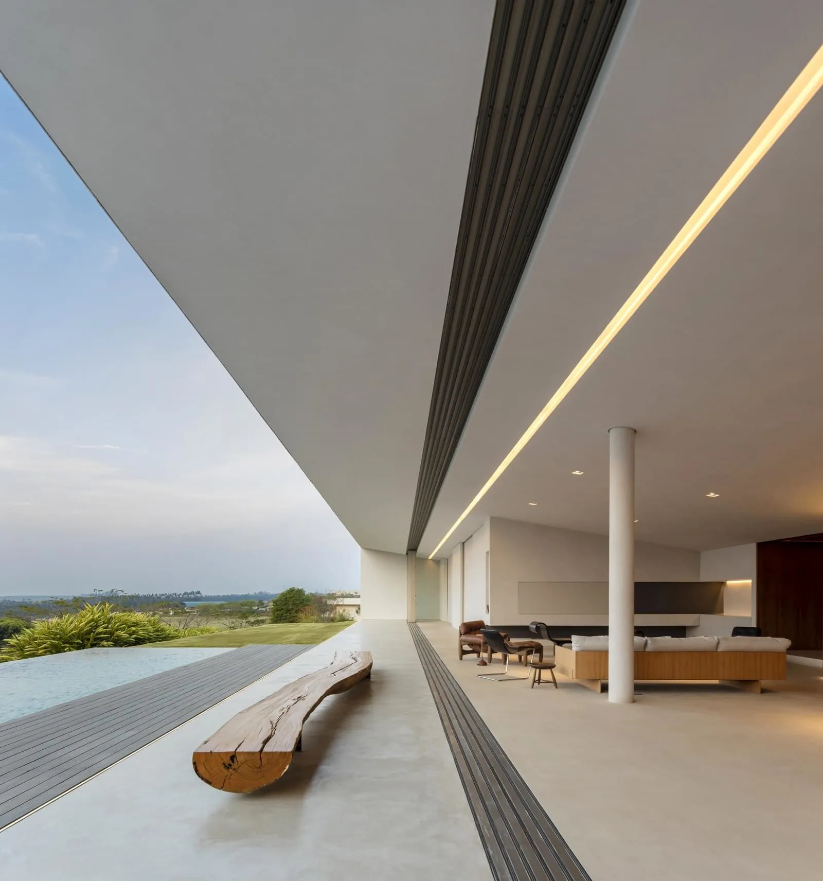 Modern living room with concrete floor and minimalist design