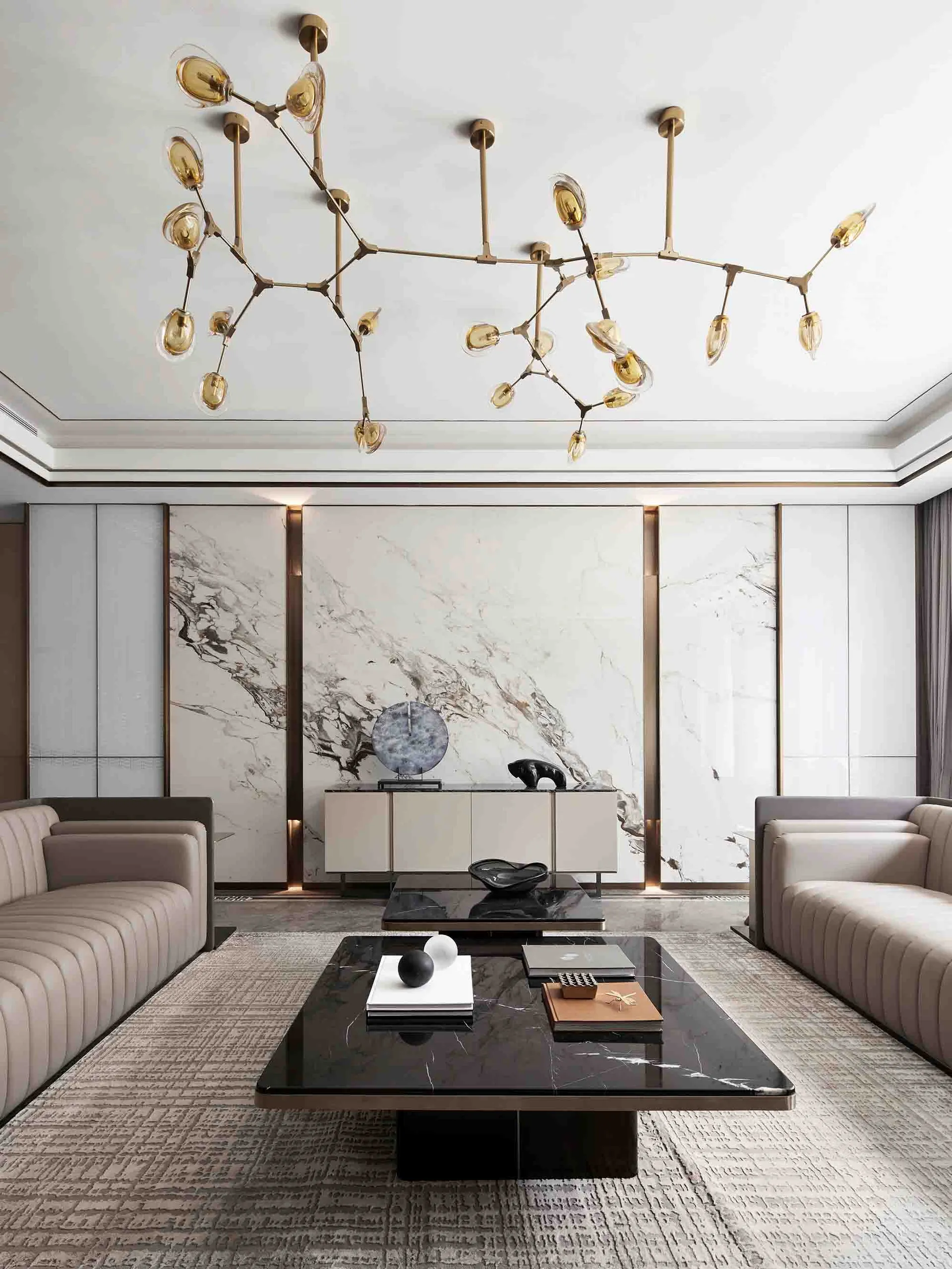 A modern living room featuring marble accents and minimalist furniture.