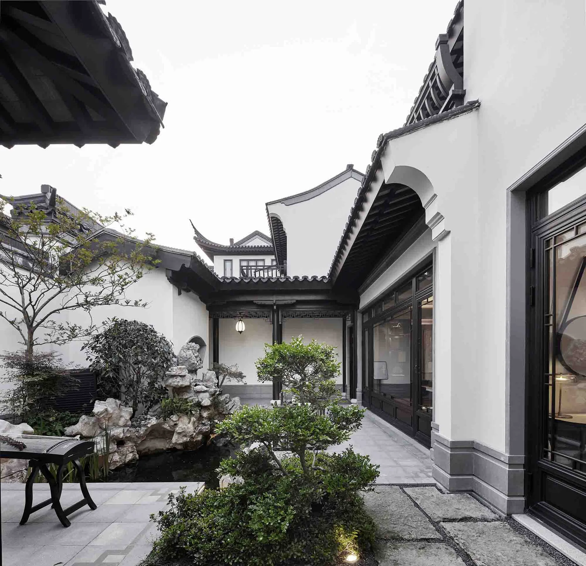 A traditional residential entryway featuring concrete and wood materials.